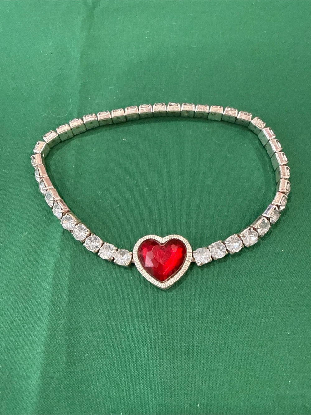 Silver-Tone Stretch Tennis Bracelet with Red Heart Centerpiece. 93F